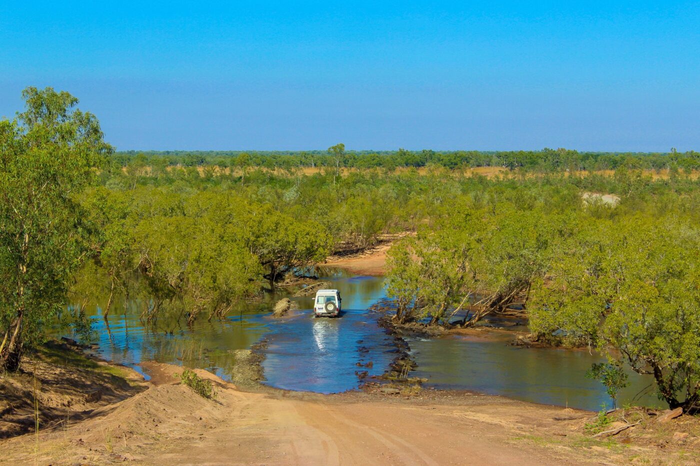 4x4 crossing an outback river in the Australian bush – nbcreations