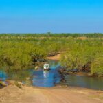 4x4 crossing an outback river in the Australian bush – nbcreations
