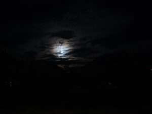 Full moon shining through clouds in a dark night sky – poetic nocturnal scene - nbcreations