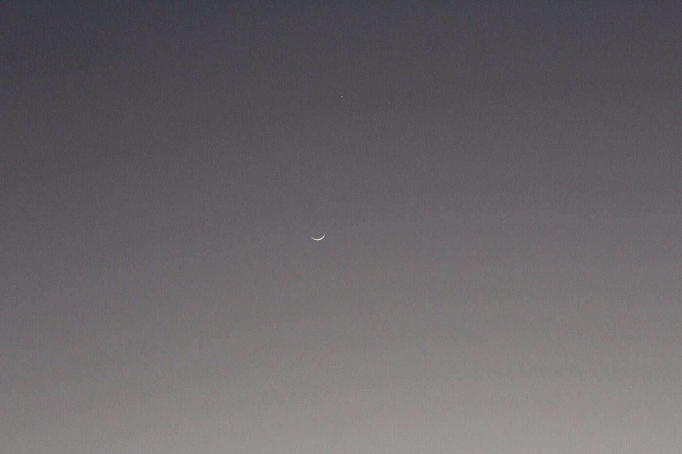 Crescent moon and Venus (evening star) in a high-contrast grey sky – minimalist night scene - nbcreations