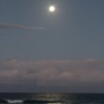 Bright full moon above the ocean with its reflection on the water – tranquil night seascape - nbcreations