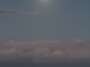 Bright full moon above the ocean with its reflection on the water – tranquil night seascape - nbcreations