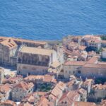 Panoramic view of Dubrovnik’s old city with terracotta rooftops and city walls along the Adriatic Sea – Croatian coastal panorama - nbcreations