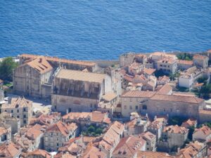 Panoramic view of Dubrovnik’s old city with terracotta rooftops and city walls along the Adriatic Sea – Croatian coastal panorama - nbcreations
