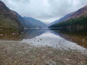 Mountain lake nestled between two peaks – tranquil alpine landscape - nbcreations