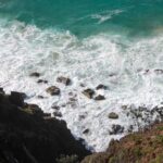 Choppy sea under clear sky with bright sunlight – lively ocean surface - nbcreations