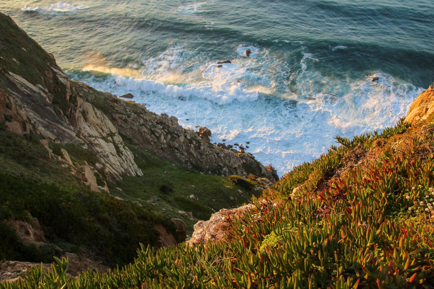 Aerial view of a cliff above the sea – top-down coastal perspective - nbcreations