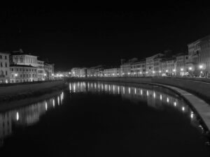Night view of city bridge with illuminated buildings over river – urban evening scene - nbcreations