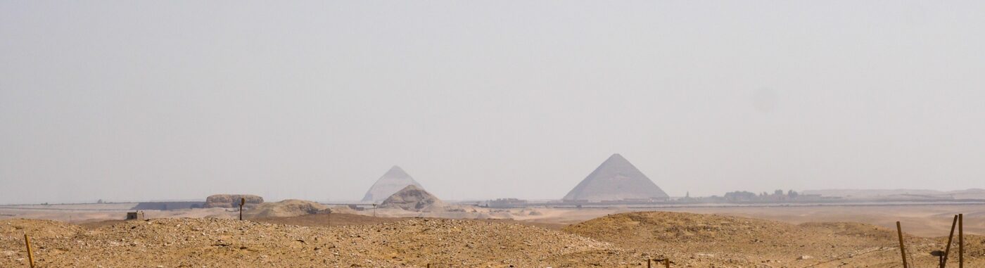 Panoramic view of Egyptian pyramids in the desert – iconic ancient monuments - nbcreations