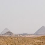 Panoramic view of Egyptian pyramids in the desert – iconic ancient monuments - nbcreations