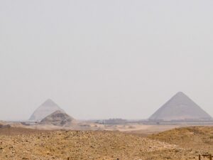 Panoramic view of Egyptian pyramids in the desert – iconic ancient monuments - nbcreations