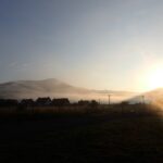 Sunset with intense golden light and layered clouds – dramatic sky composition - nbcreations