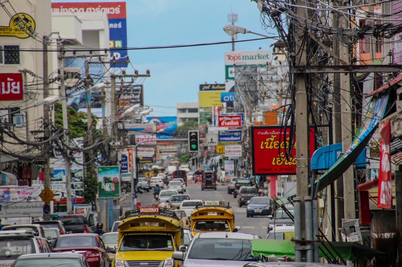 Busy city street with traffic and signs NBCcréations