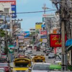 Busy city street with traffic and signs NBCcréations