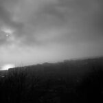 black and white Foggy landscape at sunrise over city NBCcréations