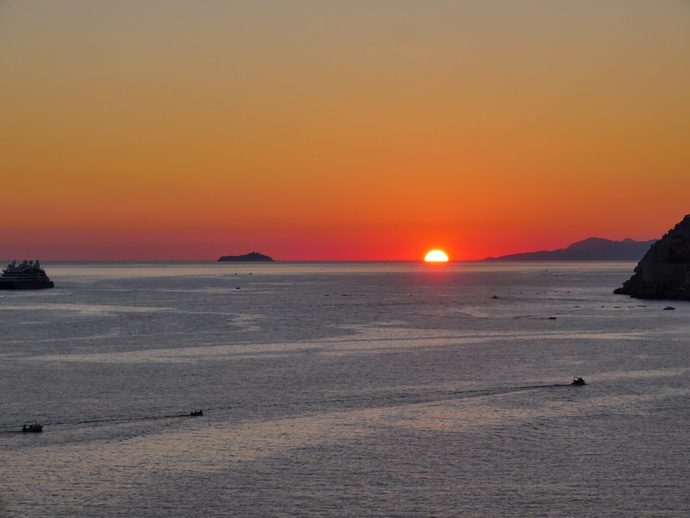 Ocean sunset view with distant islands nbcreations