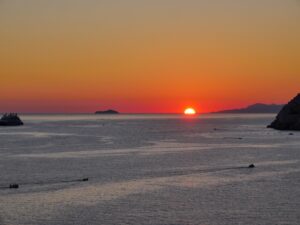 Ocean sunset view with distant islands nbcreations