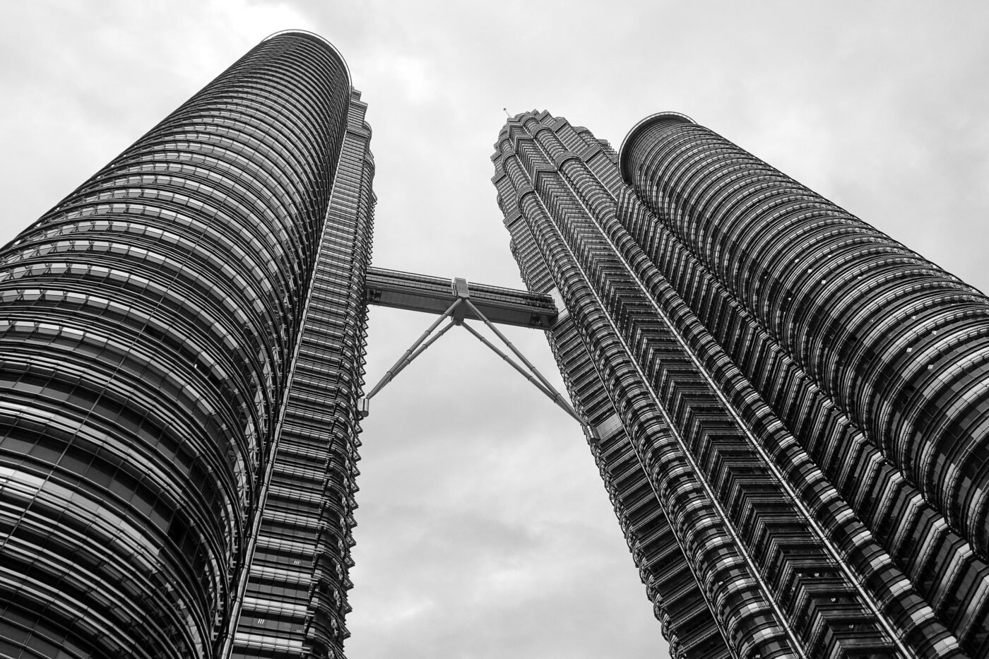Petronas Towers photographed from below – modern skyline view - nbcreations