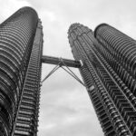 Petronas Towers photographed from below – modern skyline view - nbcreations