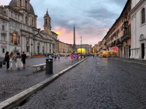 Evening scene at Piazza Navona, Rome, with baroque architecture and people strolling – nbcreations
