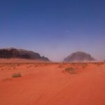 Vast desert landscape under clear blue sky , Wadi Rum Jordan nbcreations