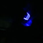 Abstract photo with blue neon light on a black background. - nbcreations
